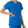 Haut médical à col en V avec empiècements en tricot Force Essentials pour femme